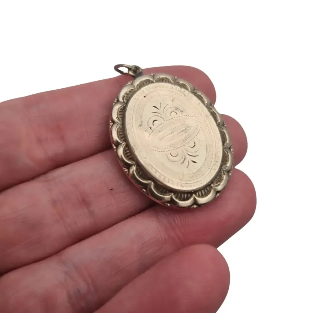 Victorian locket, antique highly decorated gilt silver pendant, Circa 1900.