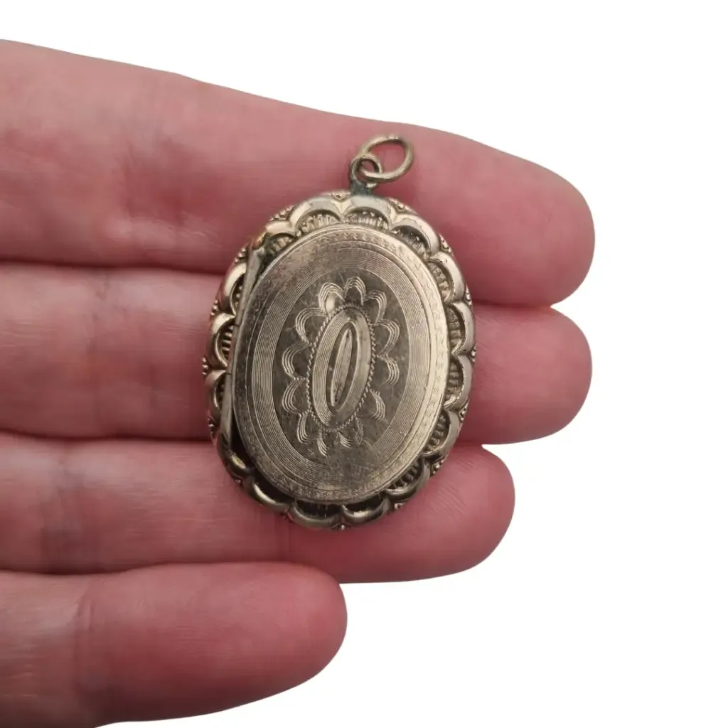 Victorian locket, antique highly decorated gilt silver pendant, Circa 1900.