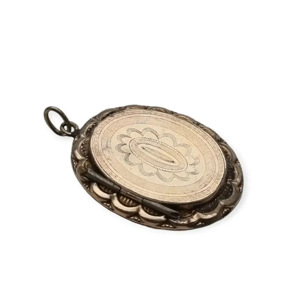 Victorian locket, antique highly decorated gilt silver pendant, Circa 1900.