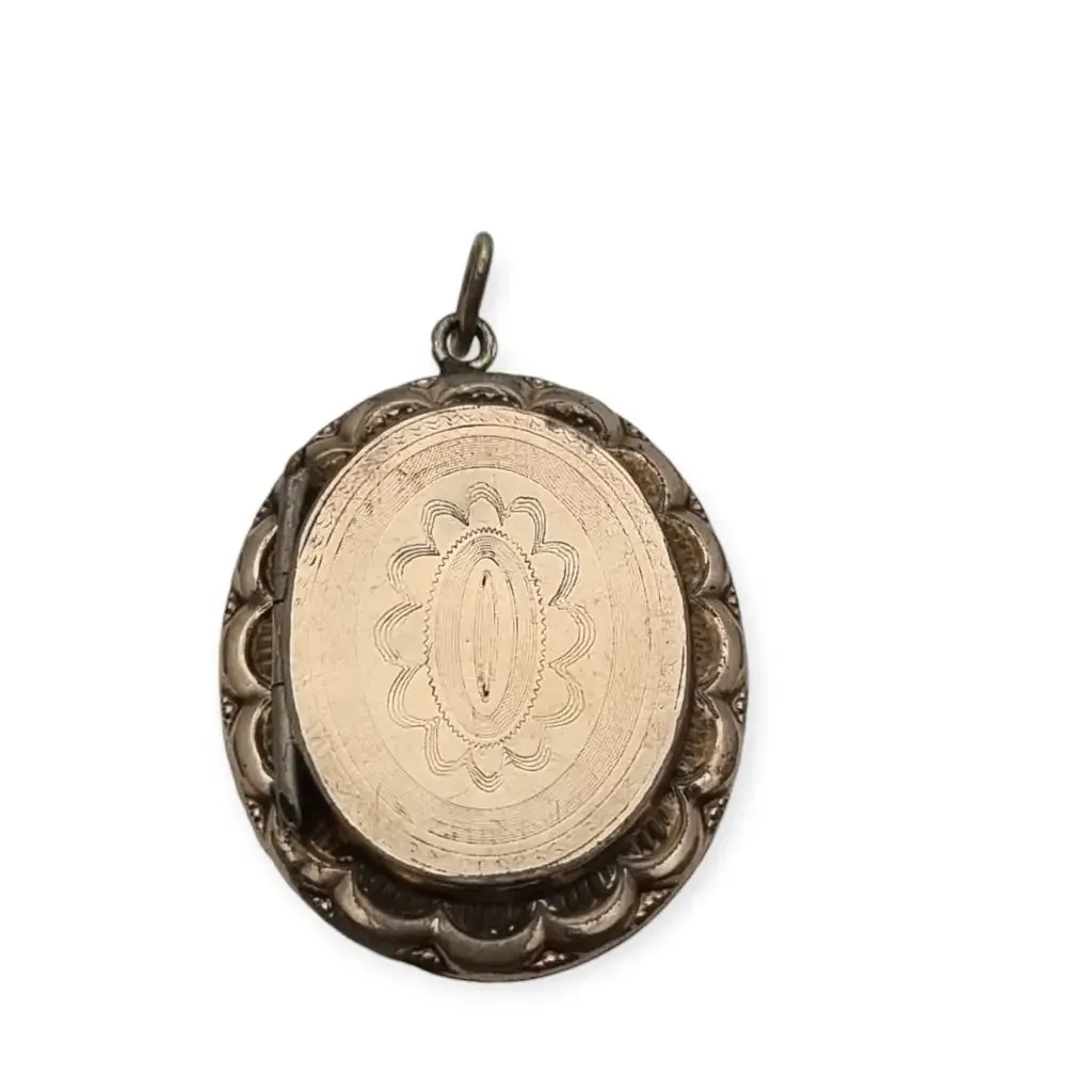 Victorian locket, antique highly decorated gilt silver pendant, Circa 1900.