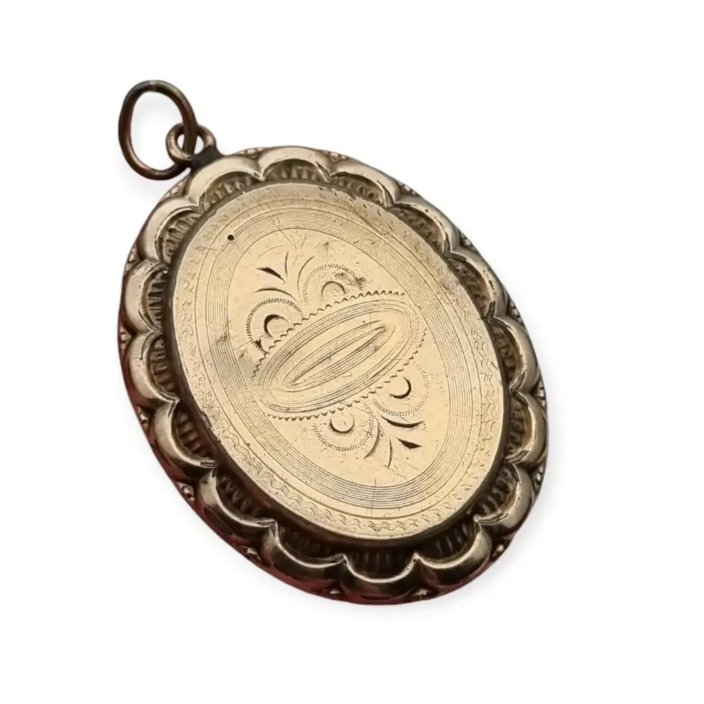 Victorian locket, antique highly decorated gilt silver pendant, Circa 1900.