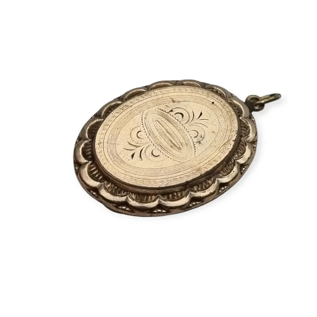 Victorian locket, antique highly decorated gilt silver pendant, Circa 1900.