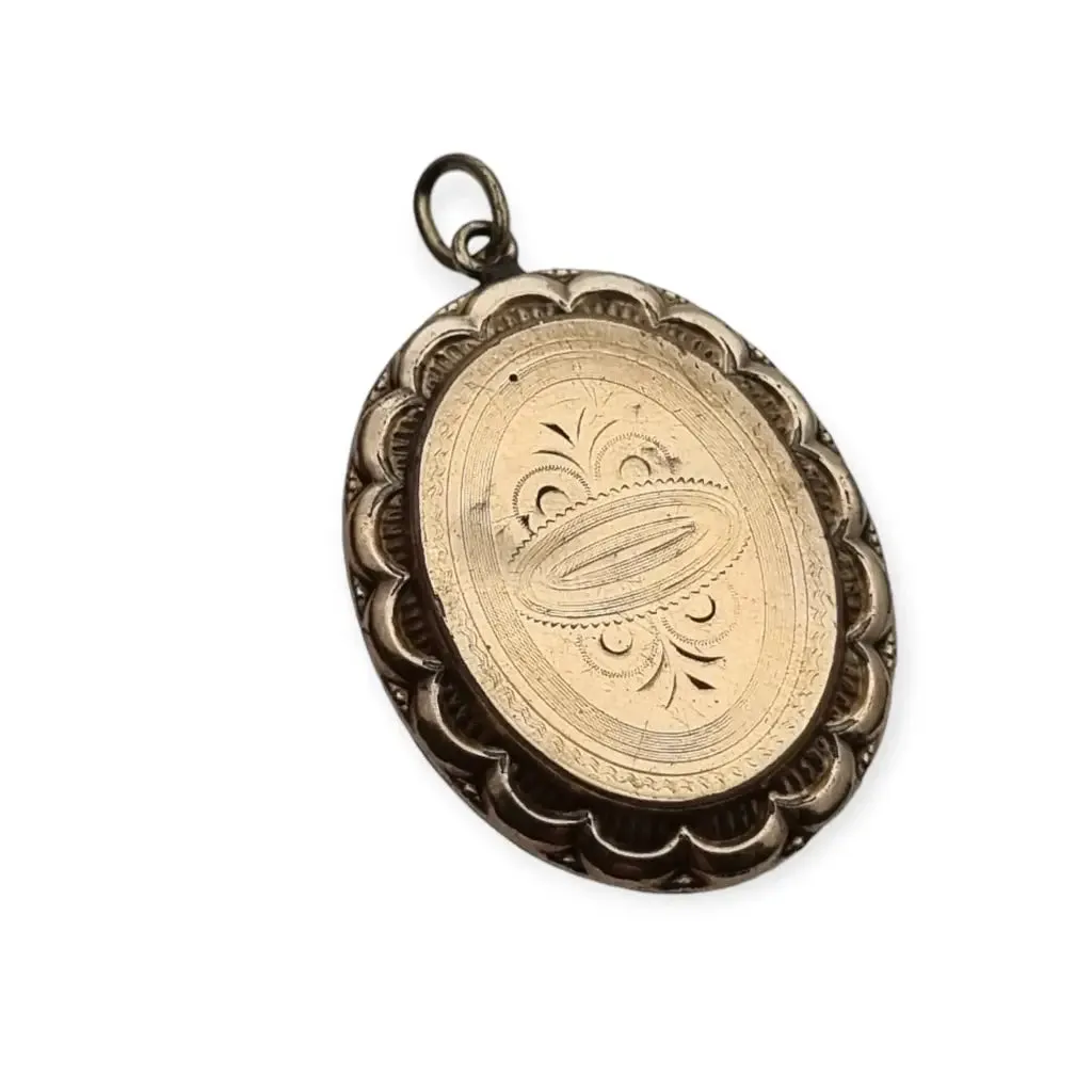 Victorian locket, antique highly decorated gilt silver pendant, Circa 1900.